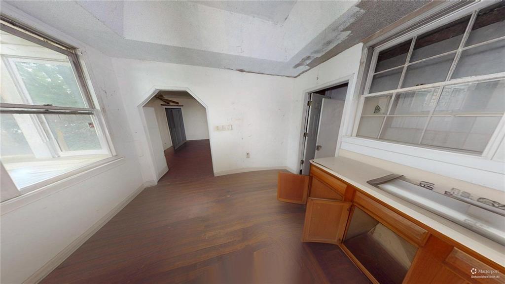 688 Main Street Whitesburg, GA 30185 - Photo 8 of 34 a view of an empty room with a window