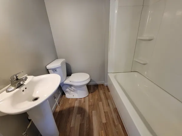 a bathroom with a sink and a toilet
