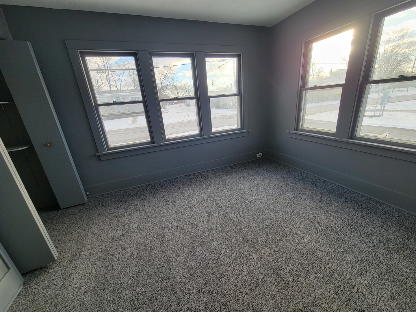 802 Deleon Street Ottawa, IL 61350 - Photo 8 of 22 an empty room with a empty space and windows