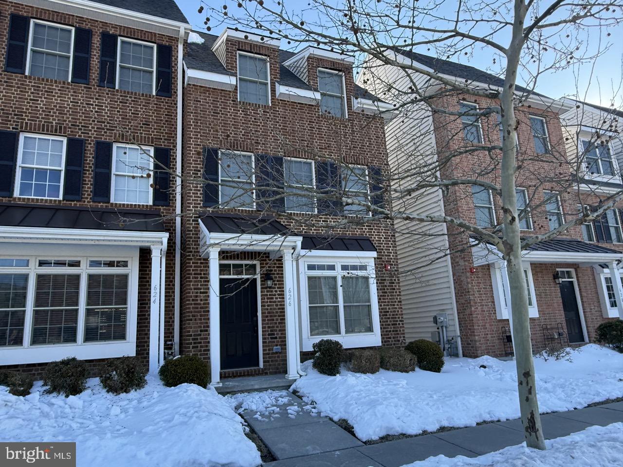 626 D Street Kennett Square, PA 19348 - Photo 2 of 24 a view of a brick building with many windows