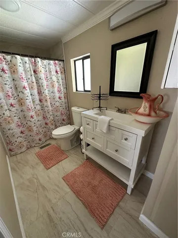 a room with a bed and a window