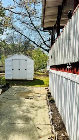 a view of small space in a backyard