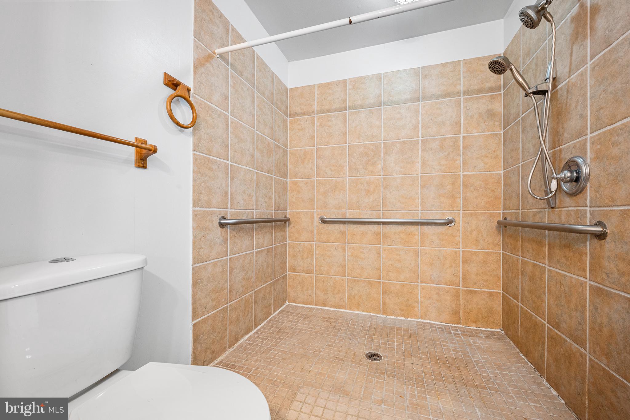 6 Tiffany Place Sicklerville, NJ 08081 - Photo 10 of 33 a bathroom with a toilet and shower