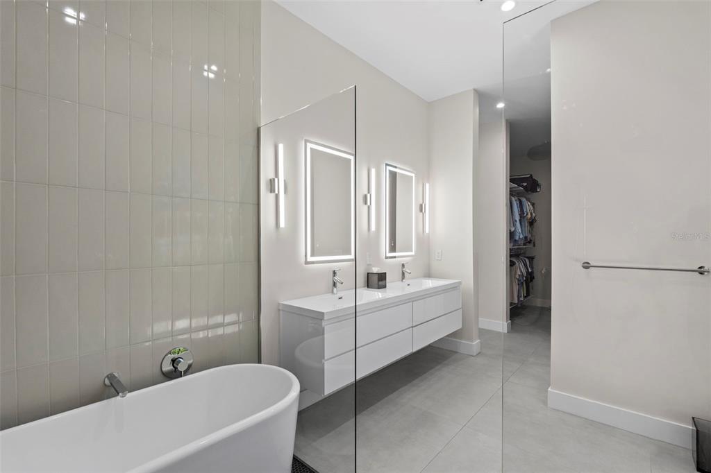 1304 Indian Rocks Road Belleair, FL 33756 - Photo 36 of 80 a bathroom with a bathtub and a sink