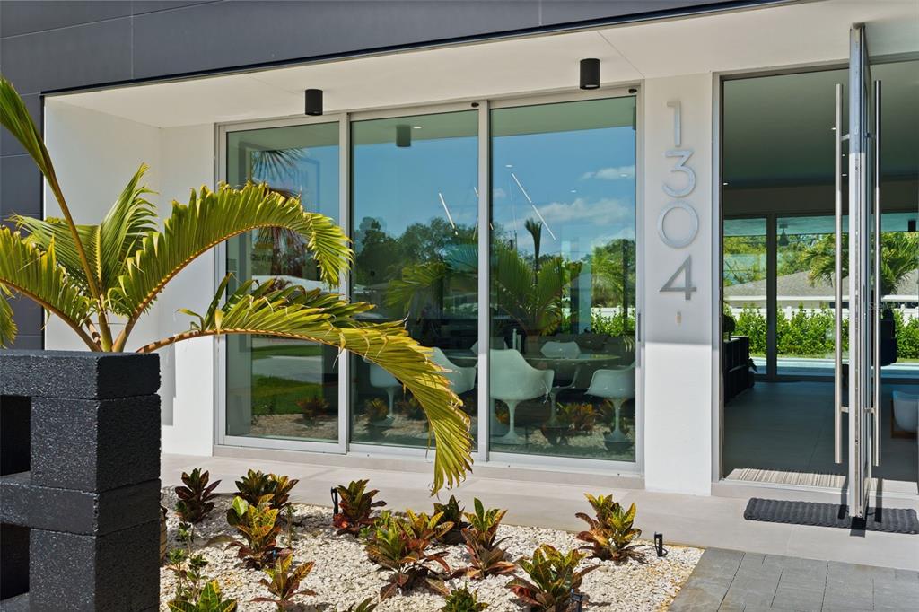 1304 Indian Rocks Road Belleair, FL 33756 - Photo 69 of 80 a view of a house with a sitting area and balcony