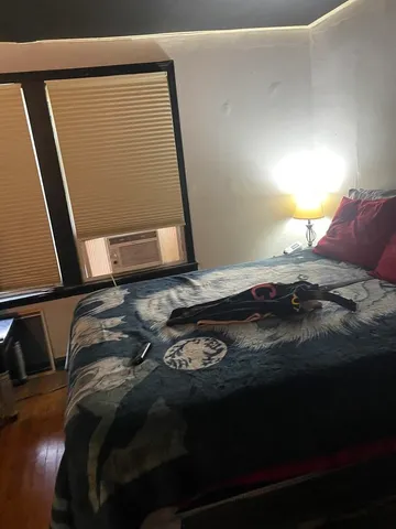 a bathroom with a sink and mirror with toilet