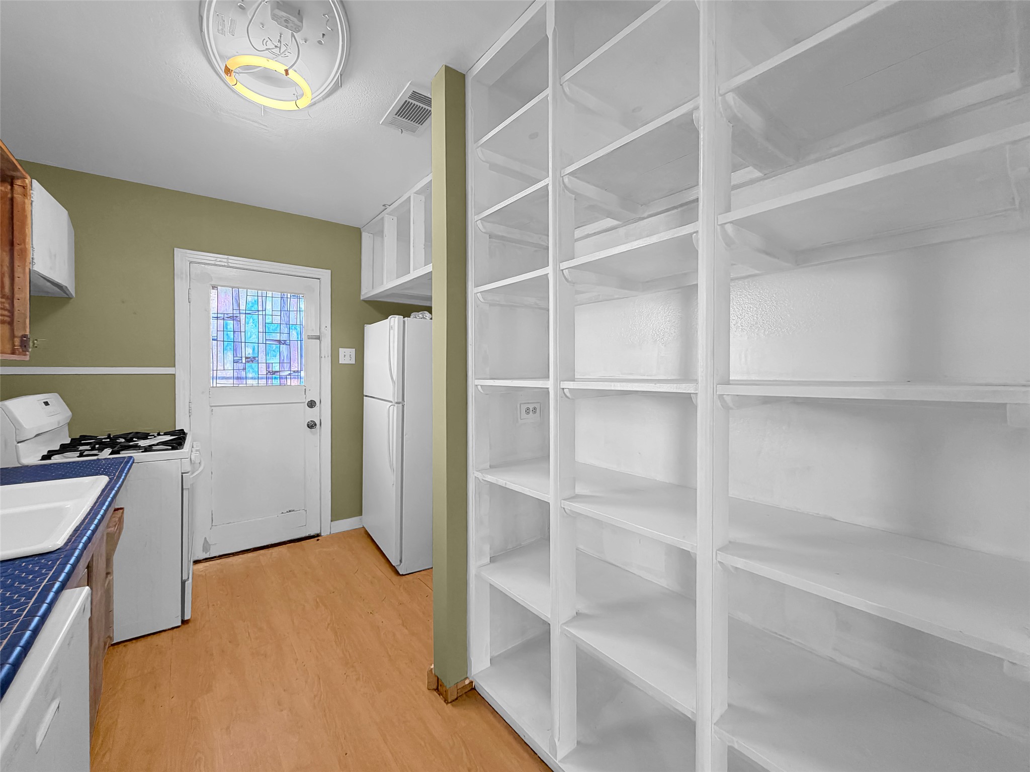 925 Long Hollow Road Dale, TX 78616 - Photo 19 of 26 Extensive built-in shelving provides ample storage
