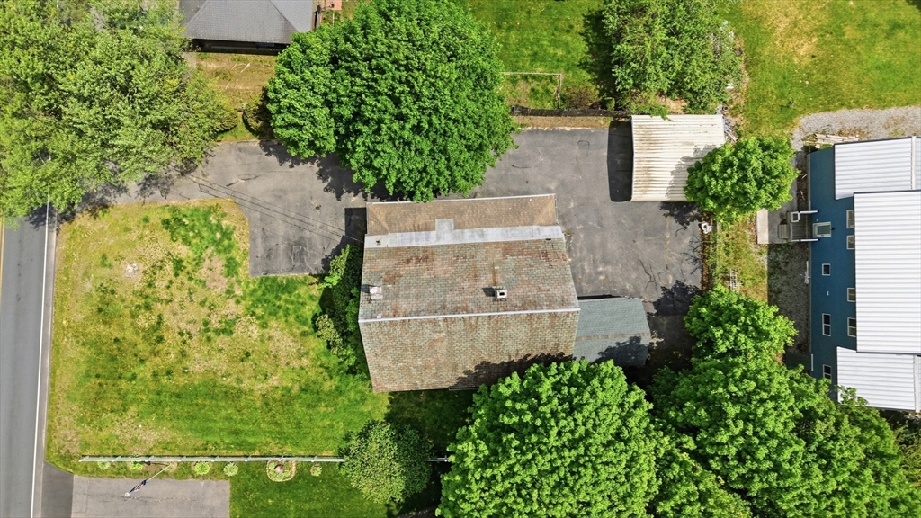 436 Franklin Road Fitchburg, MA 01420 - Photo 41 of 41 an aerial view of a house with a yard and large trees