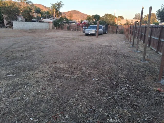 a view of a wrought iron fences in front of house