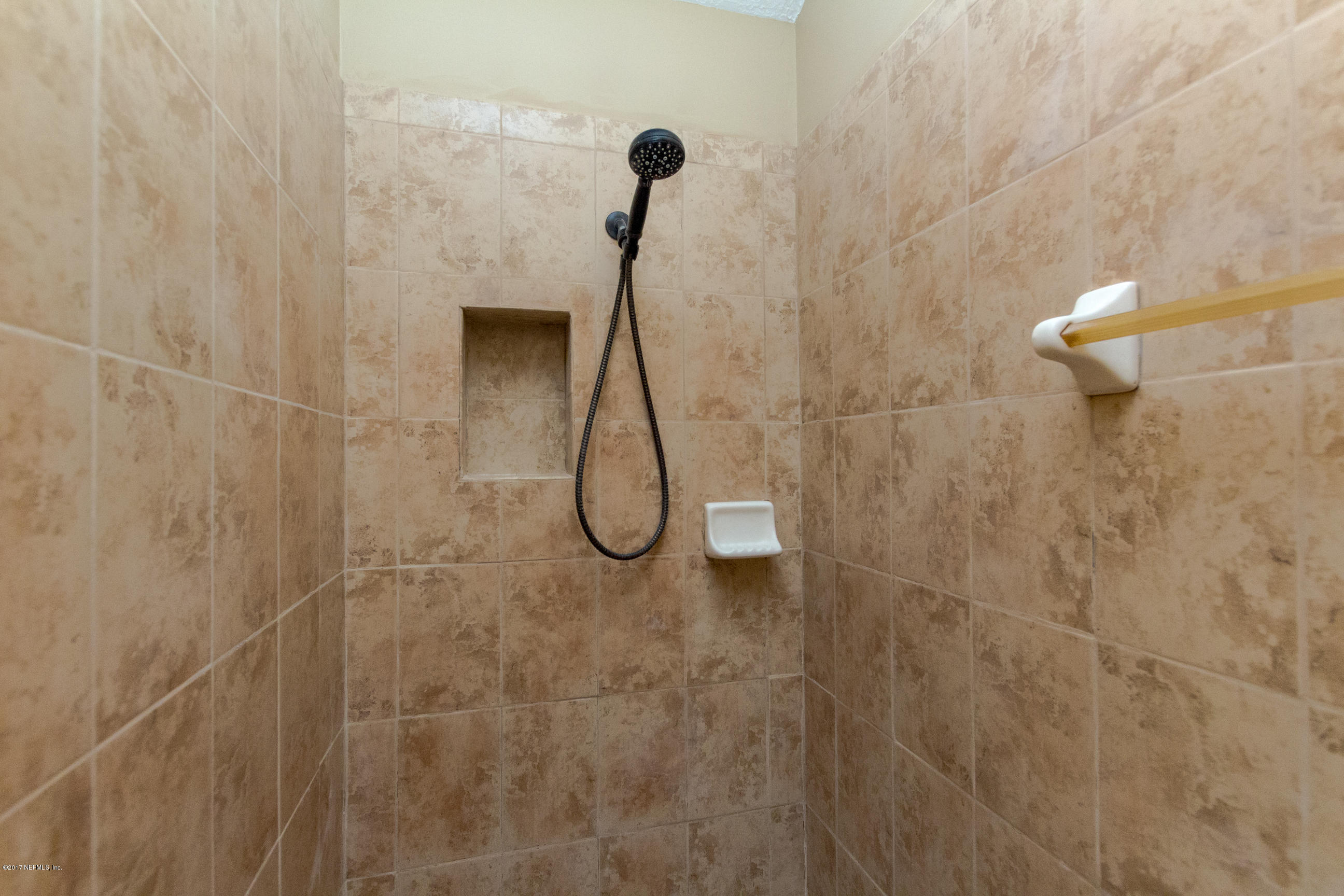 12865 Beaubien Road Jacksonville, FL 32258 - Photo 18 of 28 a bathroom with a shower
