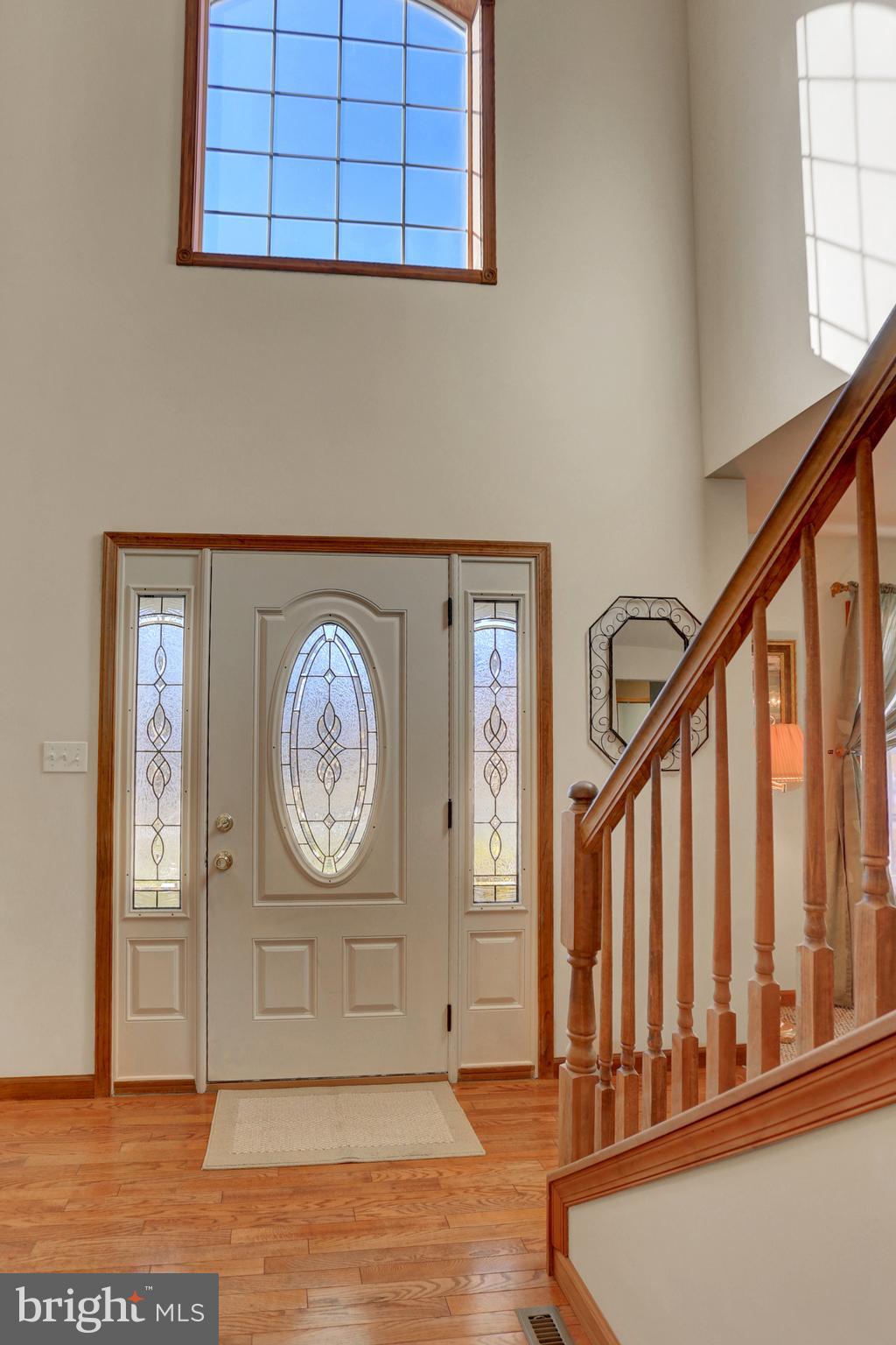 Foyer with vaulted ceilings