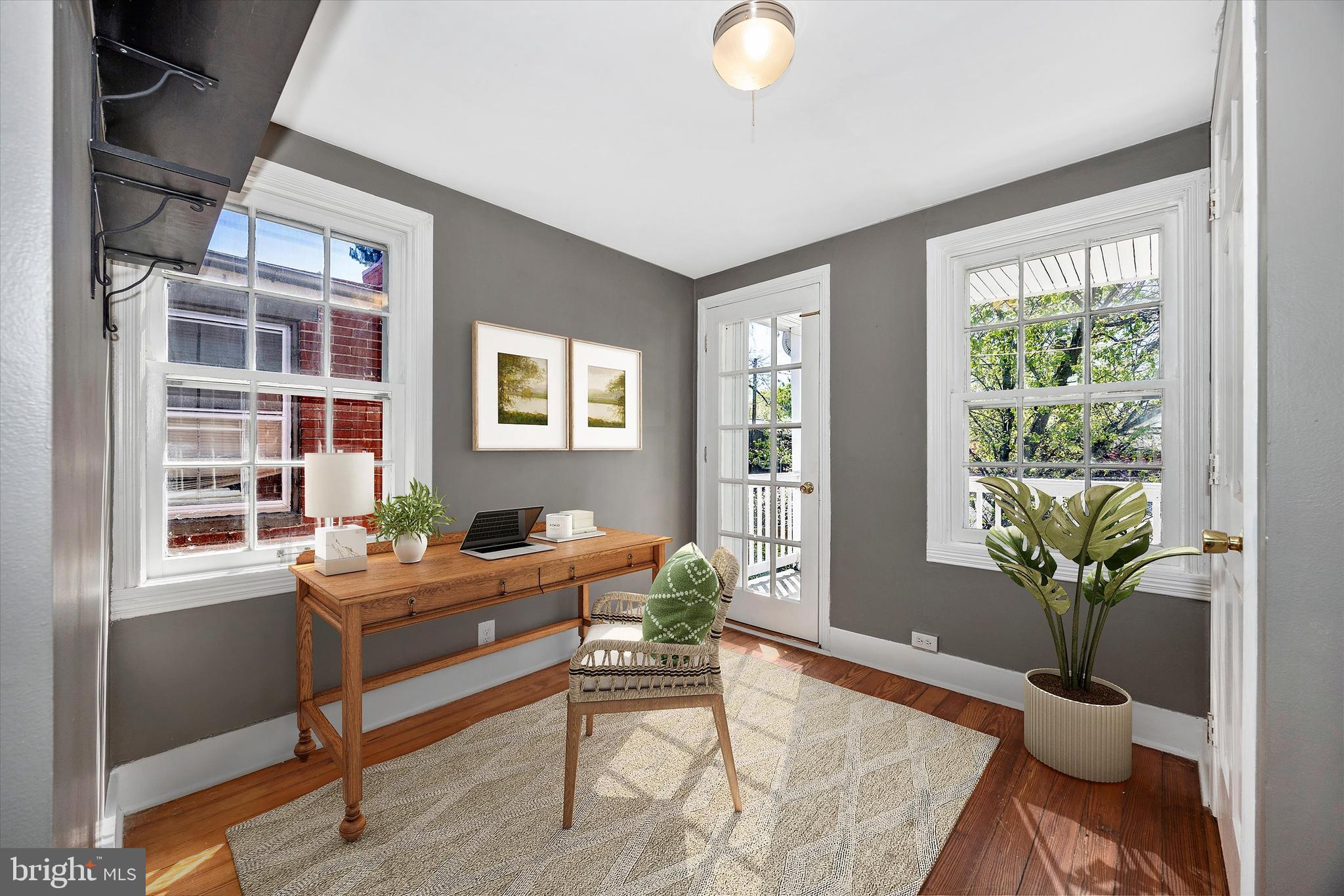 20 East 4th Street Frederick, MD 21701 - Photo 12 of 55 a work room with furniture and a potted plant
