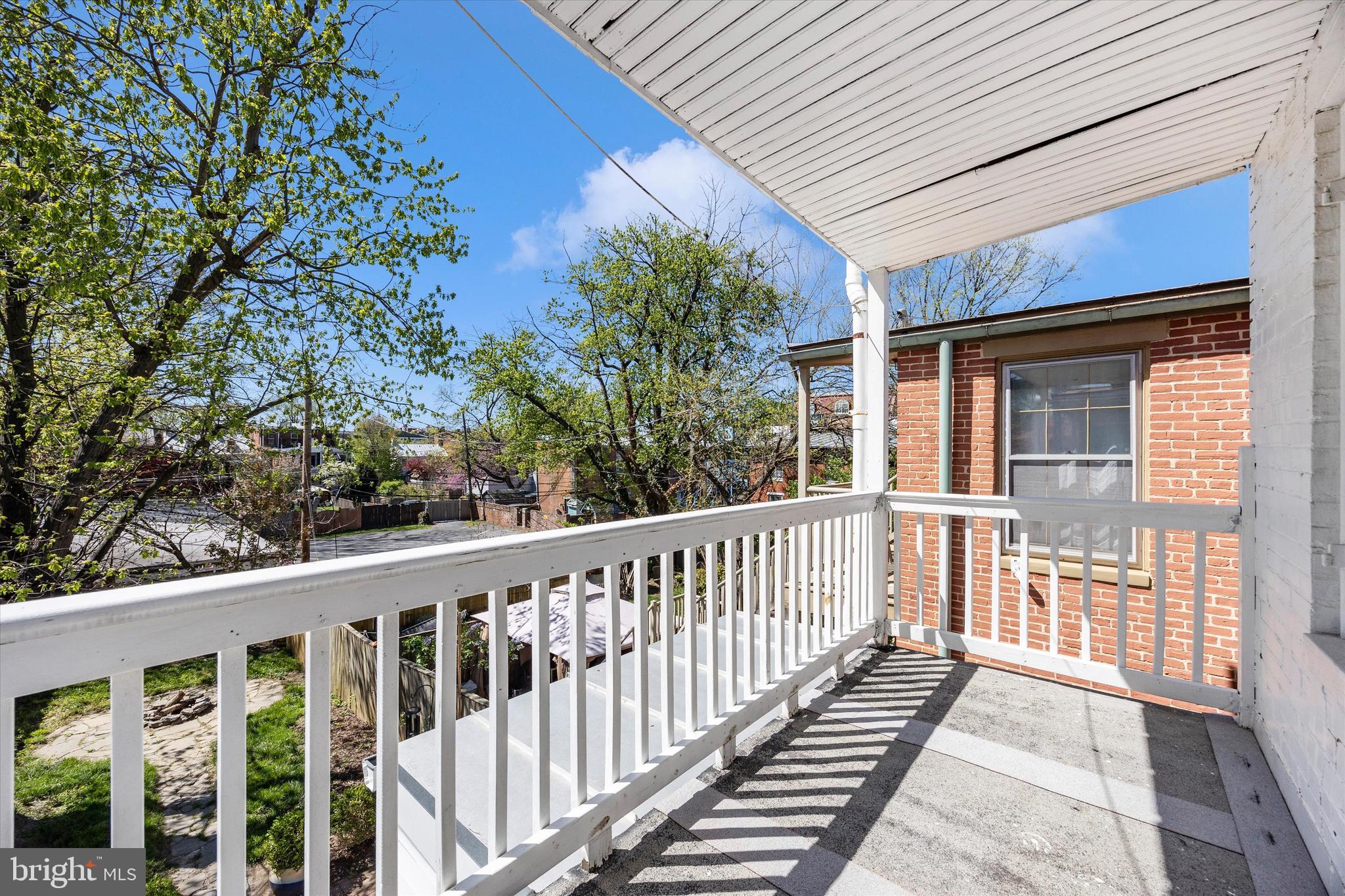 20 East 4th Street Frederick, MD 21701 - Photo 13 of 55 a view of a two chairs in the balcony