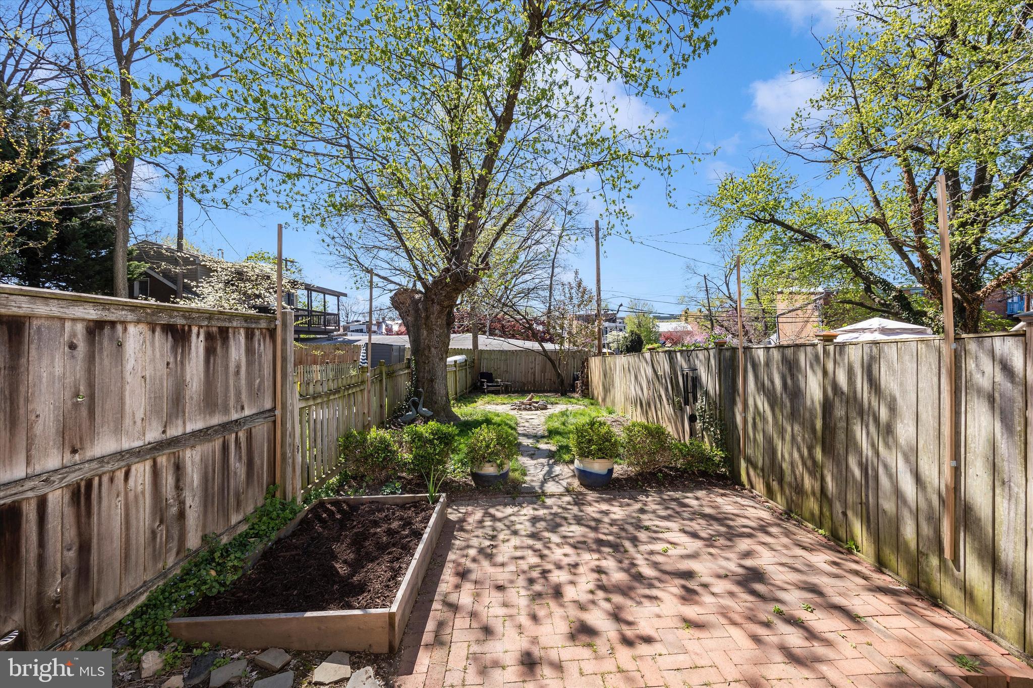 20 East 4th Street Frederick, MD 21701 - Photo 15 of 55 a view of a backyard with wooden fence