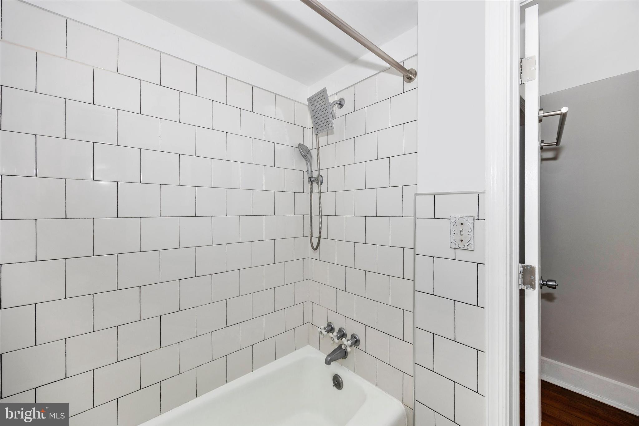 20 East 4th Street Frederick, MD 21701 - Photo 22 of 55 Tiled shower and tub in 2nd floor bathroom