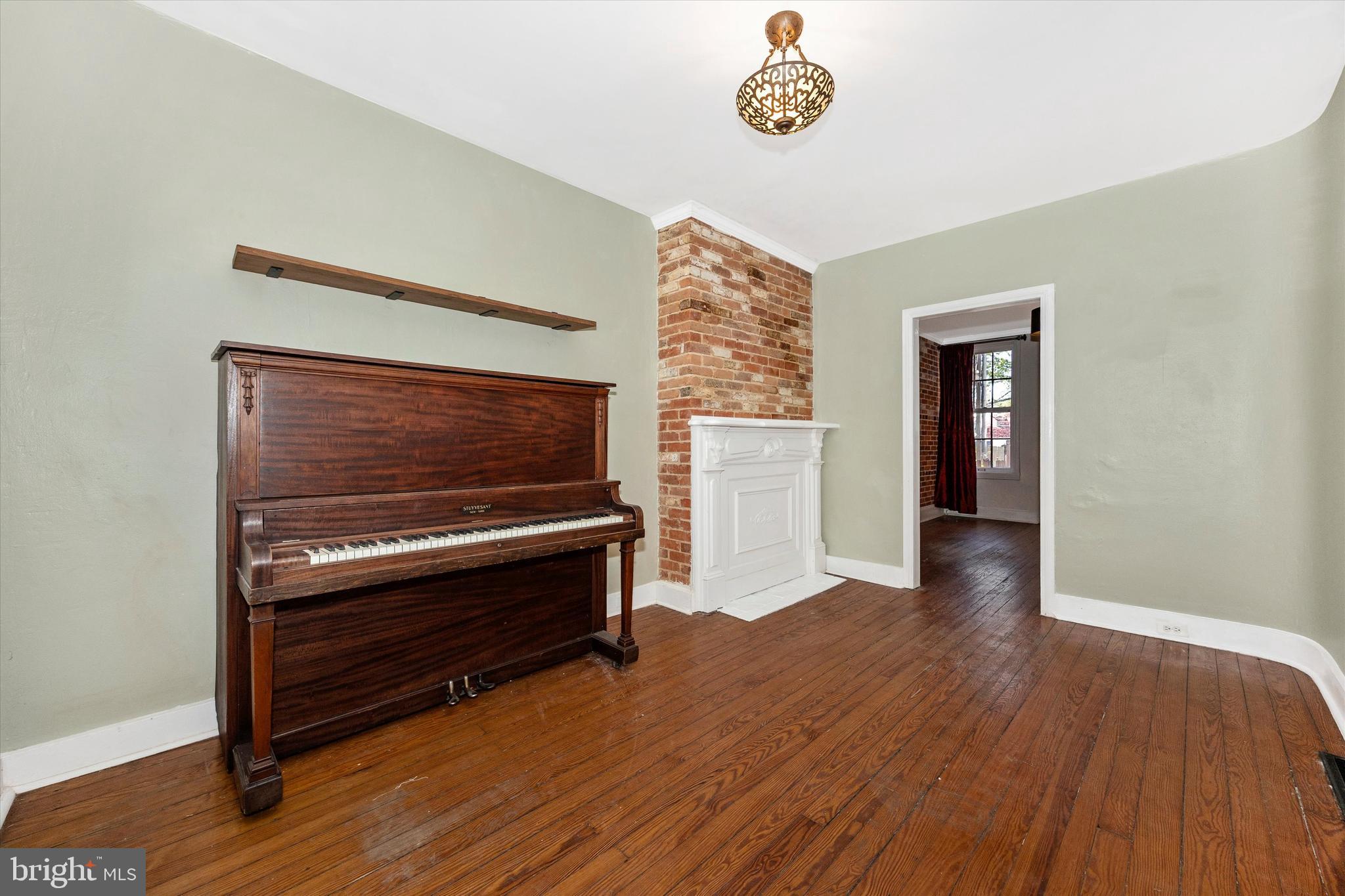 20 East 4th Street Frederick, MD 21701 - Photo 27 of 55 a view of room with wooden floor and window