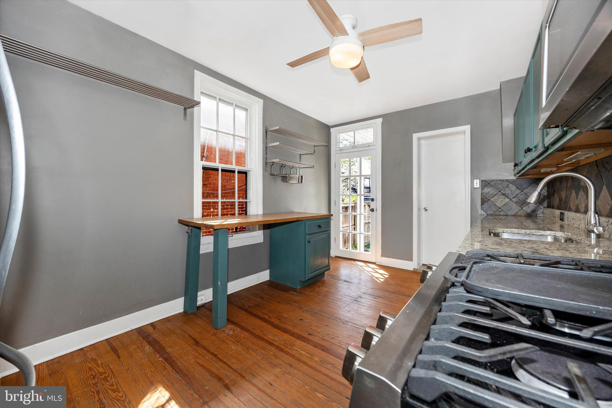 20 East 4th Street Frederick, MD 21701 - Photo 32 of 55 a living room with furniture and a wooden floor