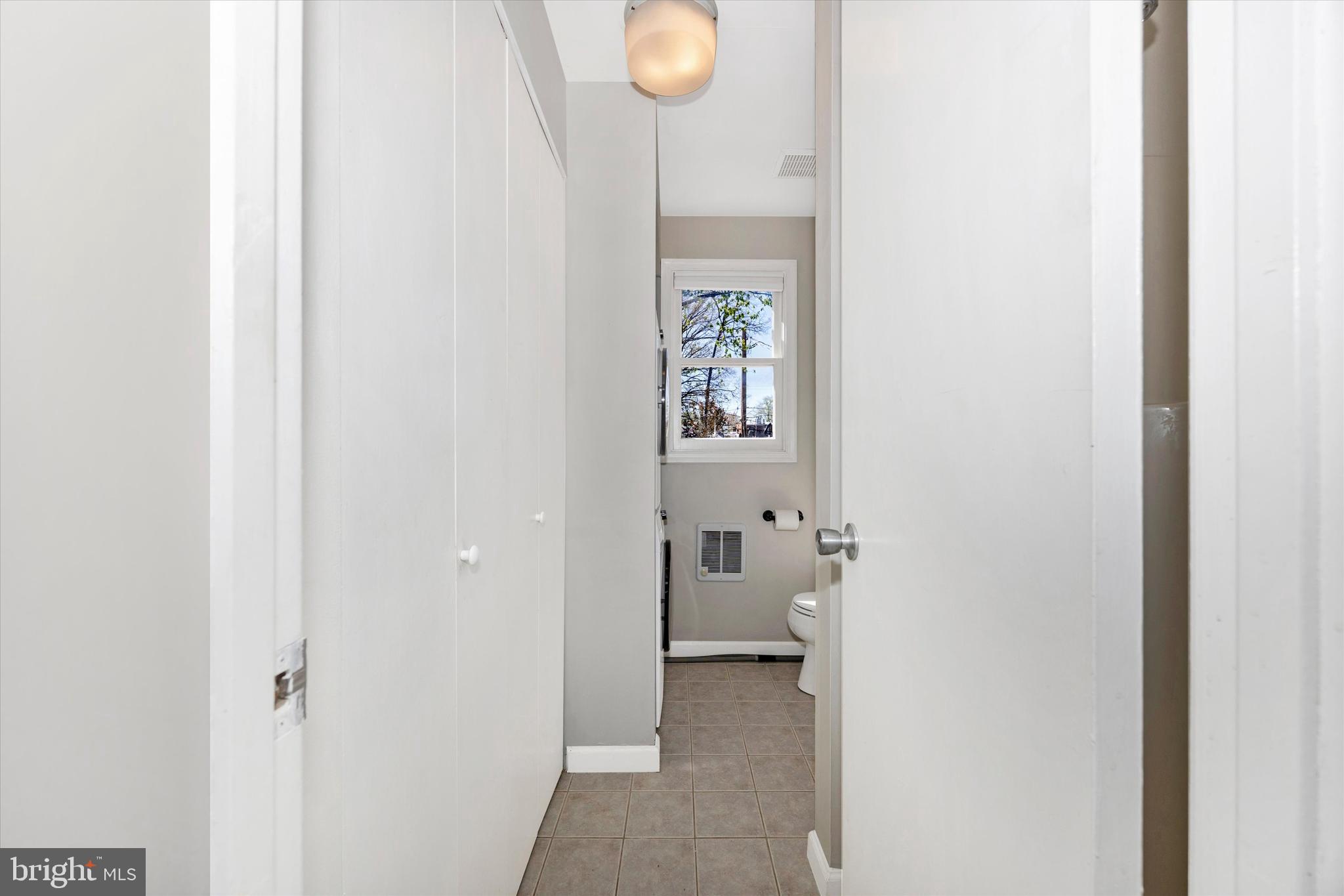 20 East 4th Street Frederick, MD 21701 - Photo 34 of 55 a view of a bathroom from a hallway