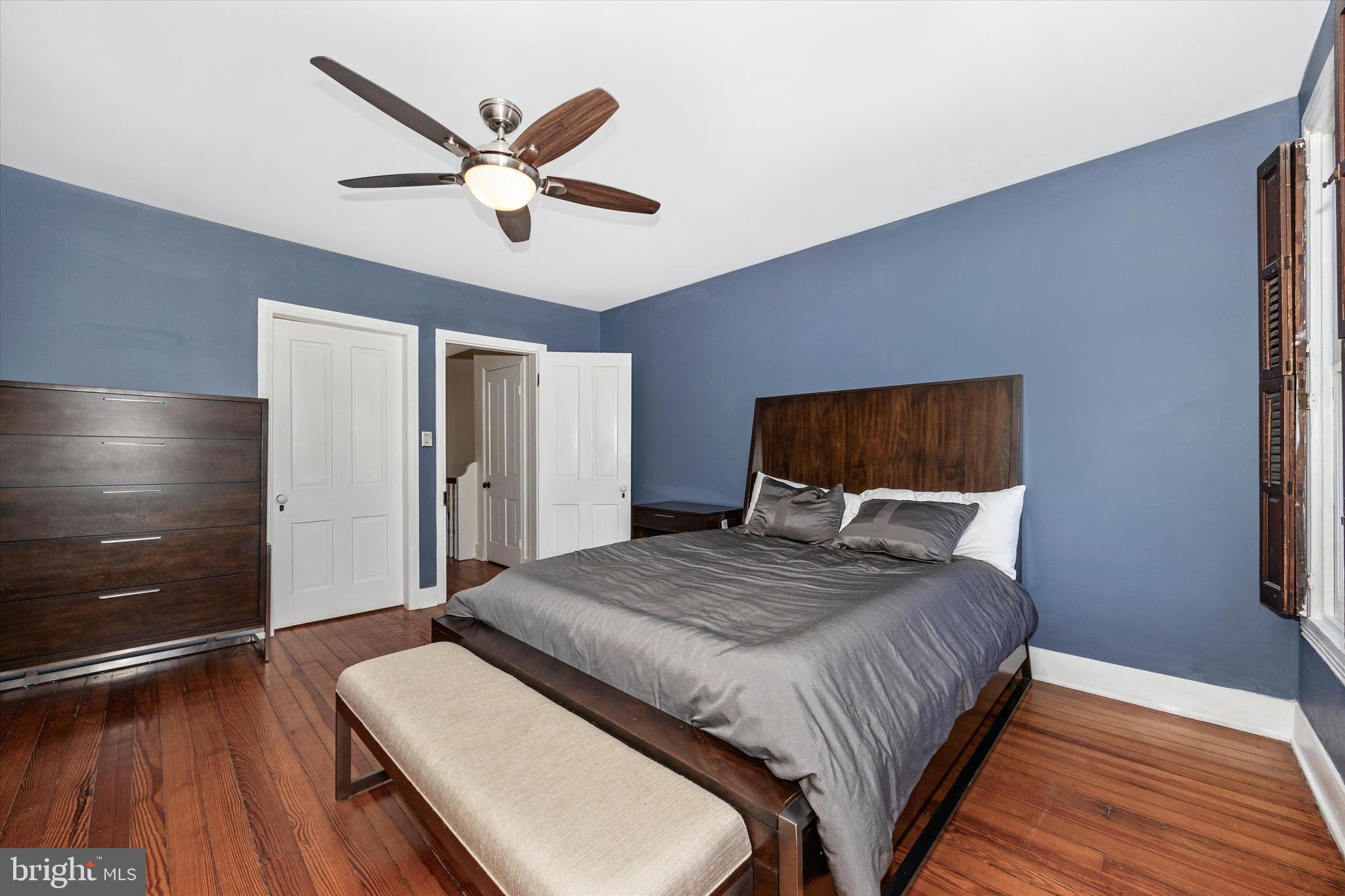 20 East 4th Street Frederick, MD 21701 - Photo 39 of 55 a bedroom with a bed and a ceiling fan