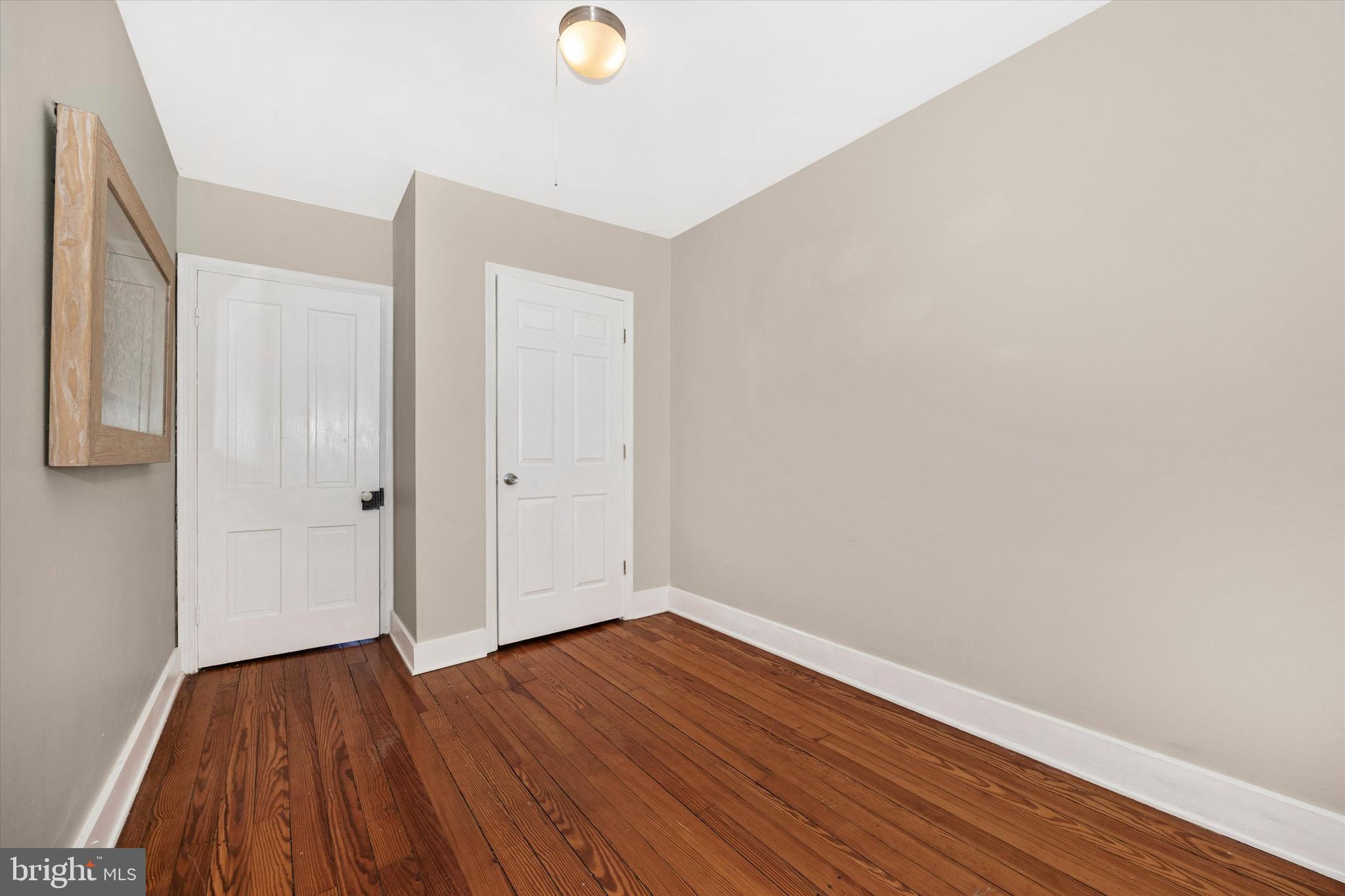 20 East 4th Street Frederick, MD 21701 - Photo 42 of 55 a view of an empty room with wooden floor
