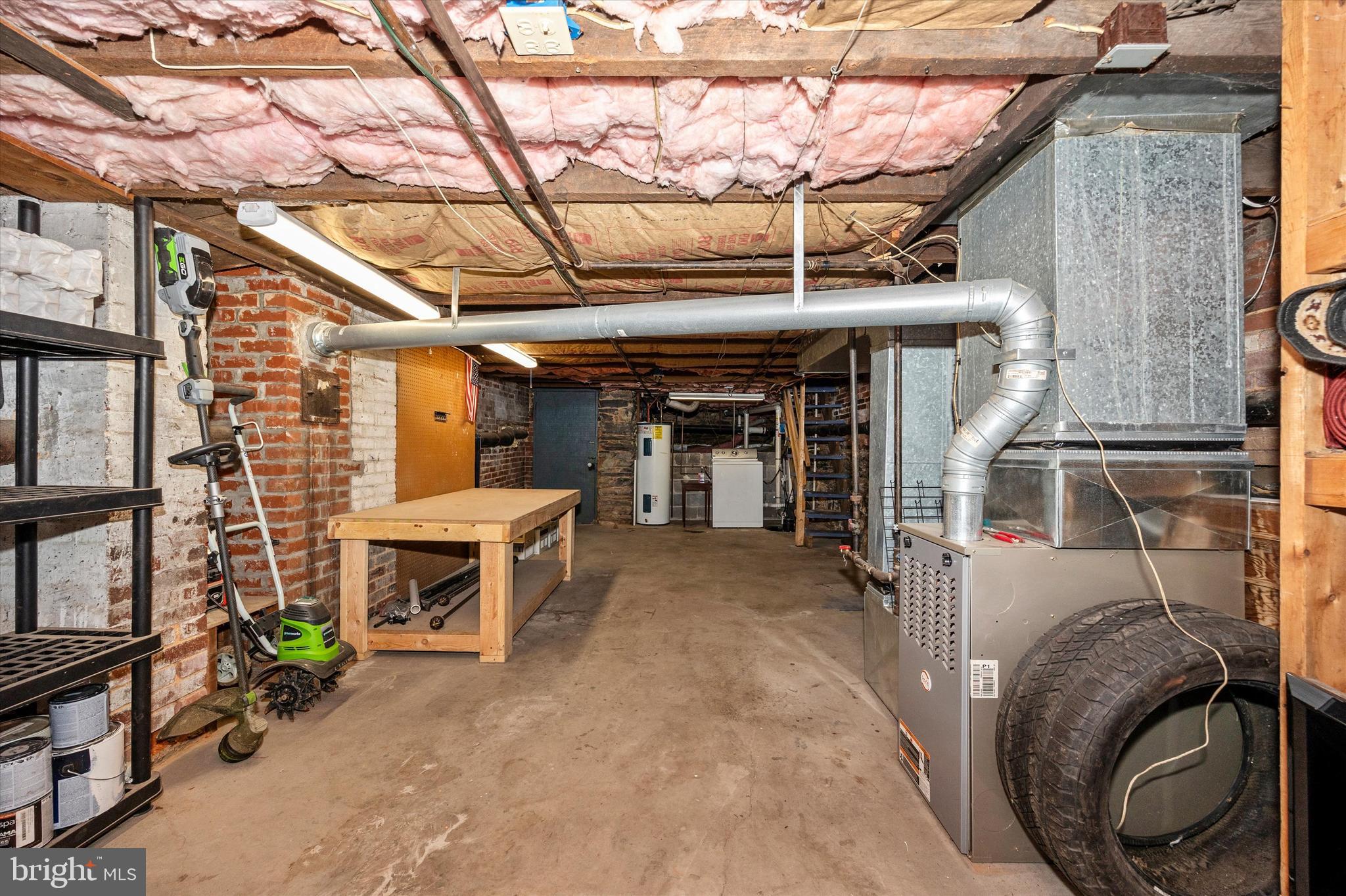 20 East 4th Street Frederick, MD 21701 - Photo 46 of 55 a view of a porch with furniture and a tree
