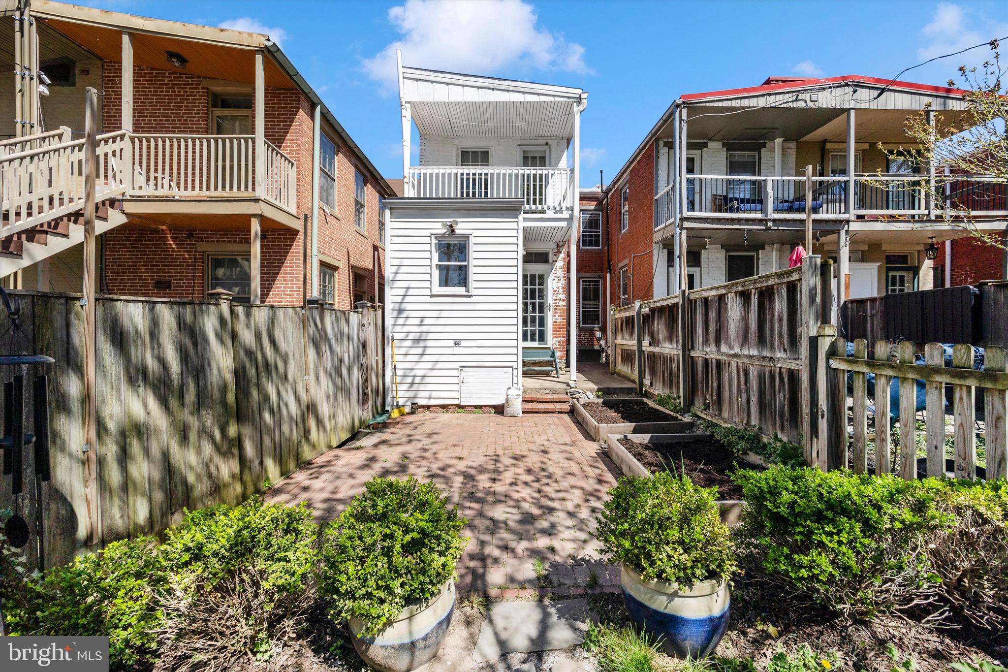 20 East 4th Street Frederick, MD 21701 - Photo 50 of 55 a front view of a house with a yard