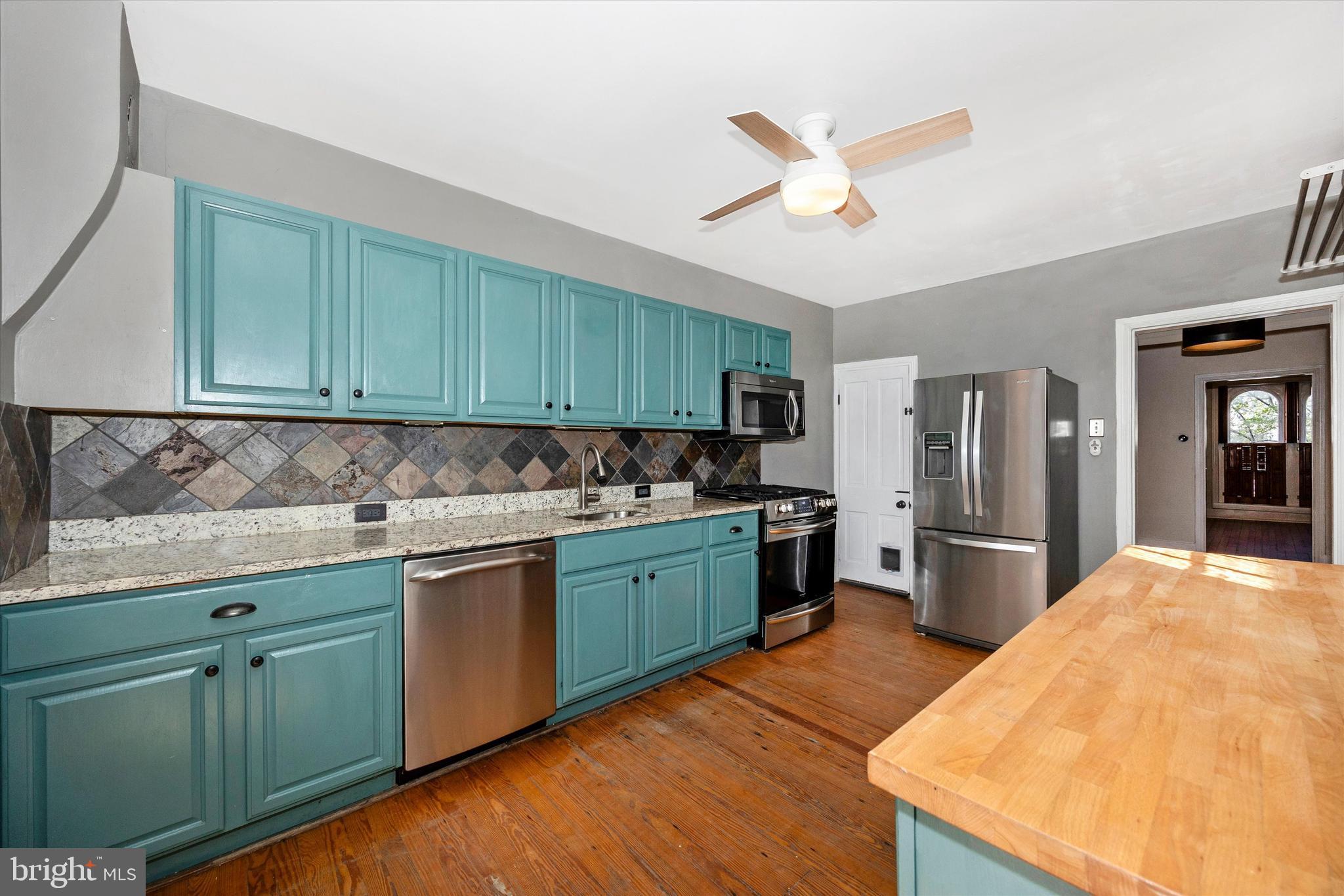 20 East 4th Street Frederick, MD 21701 - Photo 5 of 55 a kitchen with stainless steel appliances granite countertop a sink stove and refrigerator