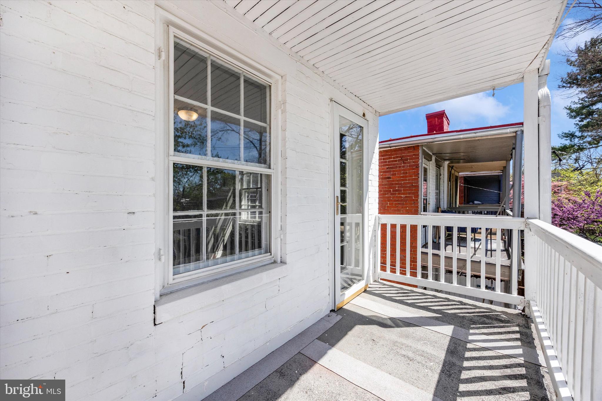 20 East 4th Street Frederick, MD 21701 - Photo 7 of 55 a view of a house with entryway and wooden floor