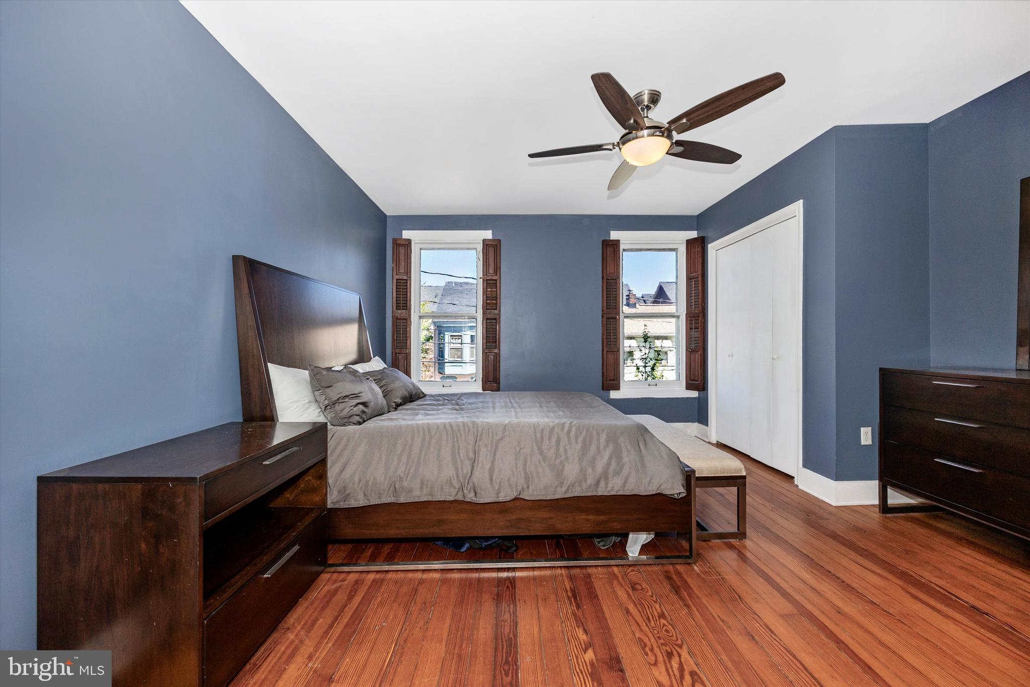 20 East 4th Street Frederick, MD 21701 - Photo 10 of 55 a bed room with a bed and a ceiling fan