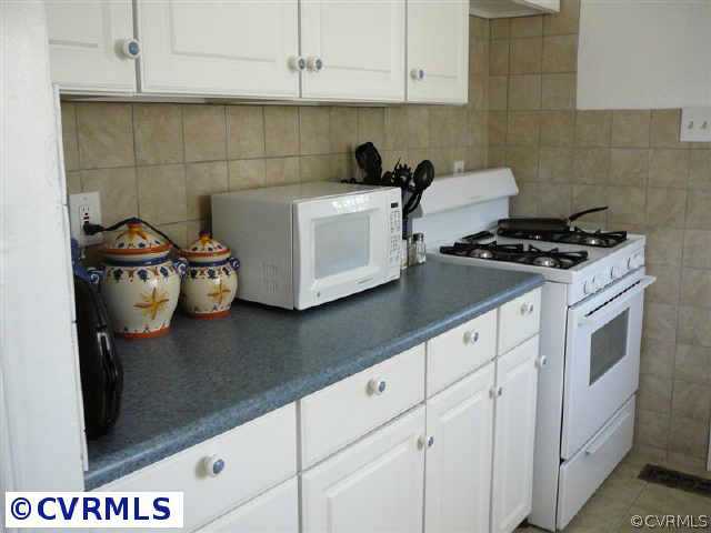 1801 Skipwith Road Richmond, VA 23229 - Photo 4 of 10 Other - Ceramic tile back-splash, new cabinets & stove, ceramic tile floor in kitchen