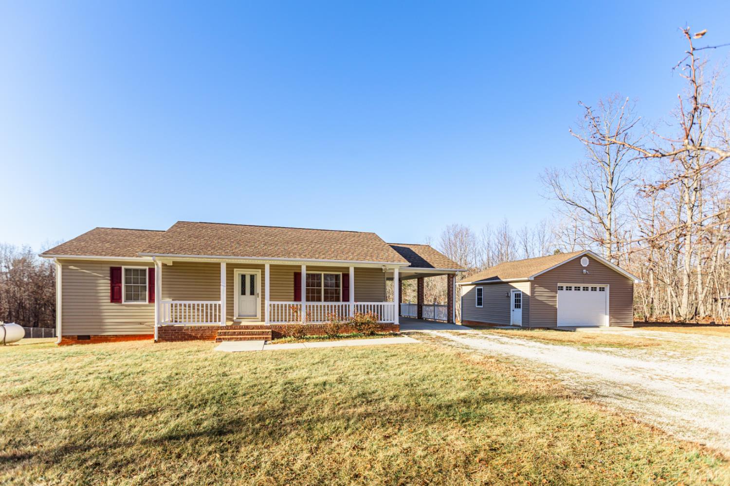 1975 Morning Star Road Appomattox, VA 24522 - Photo 1 of 29 a front view of a house with a yard