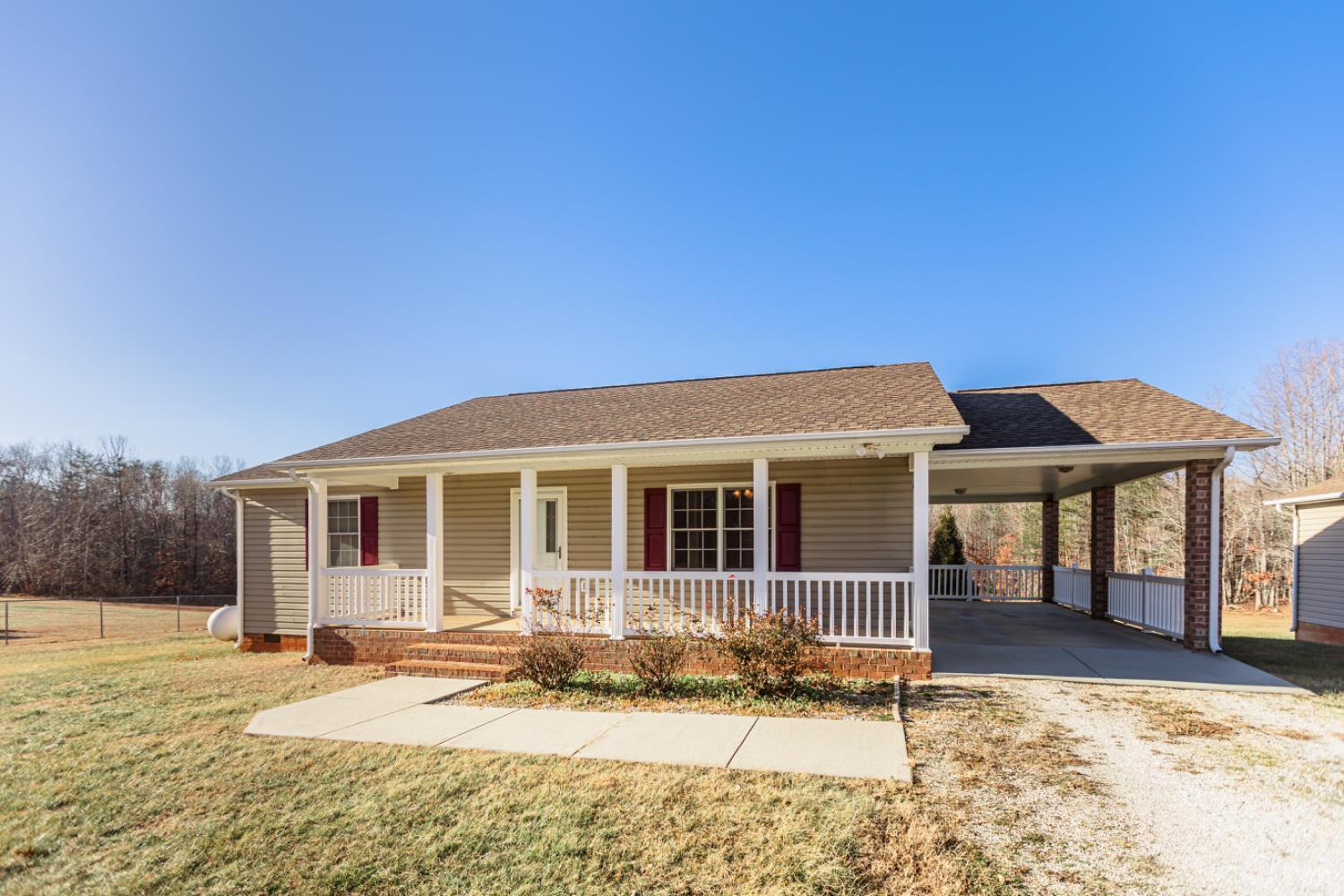 1975 Morning Star Road Appomattox, VA 24522 - Photo 3 of 29 a backyard of a house with yard and outdoor seating