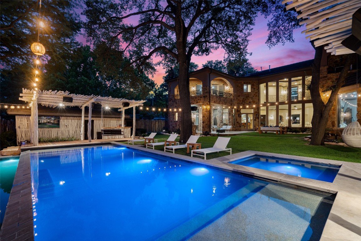 2803 Pearce Road Austin, TX 78730 - Photo 1 of 1 a view of a house with swimming pool and sitting area