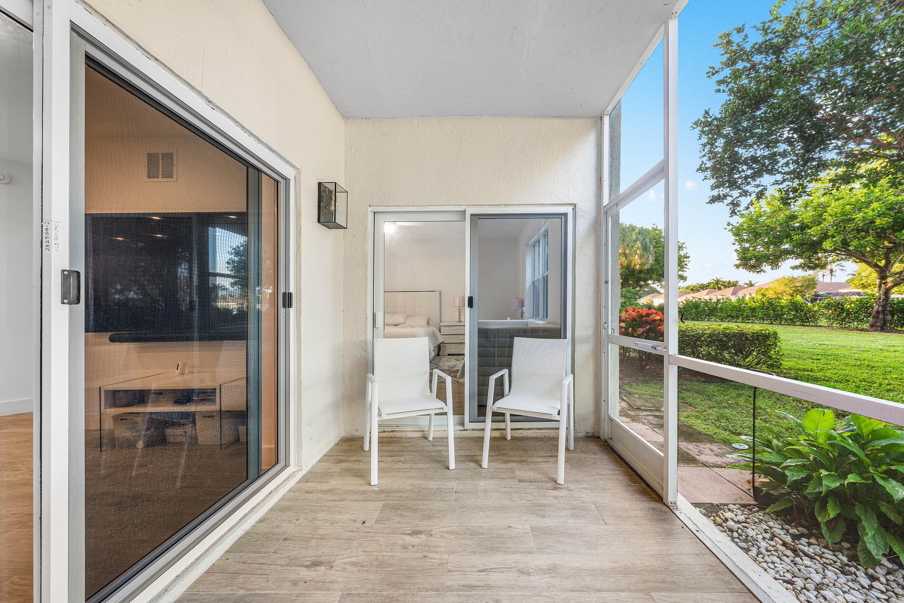 6229 Graycliff Drive, Unit A Boca Raton, FL 33496 - Photo 25 of 32 Screened-in Patio