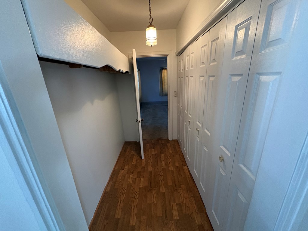 2534 Cole Drive Columbus, GA 31906 - Photo 11 of 18 a view of a hallway with wooden floor and staircase