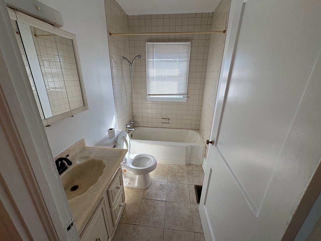 2534 Cole Drive Columbus, GA 31906 - Photo 17 of 18 a bathroom with a sink a toilet and shower