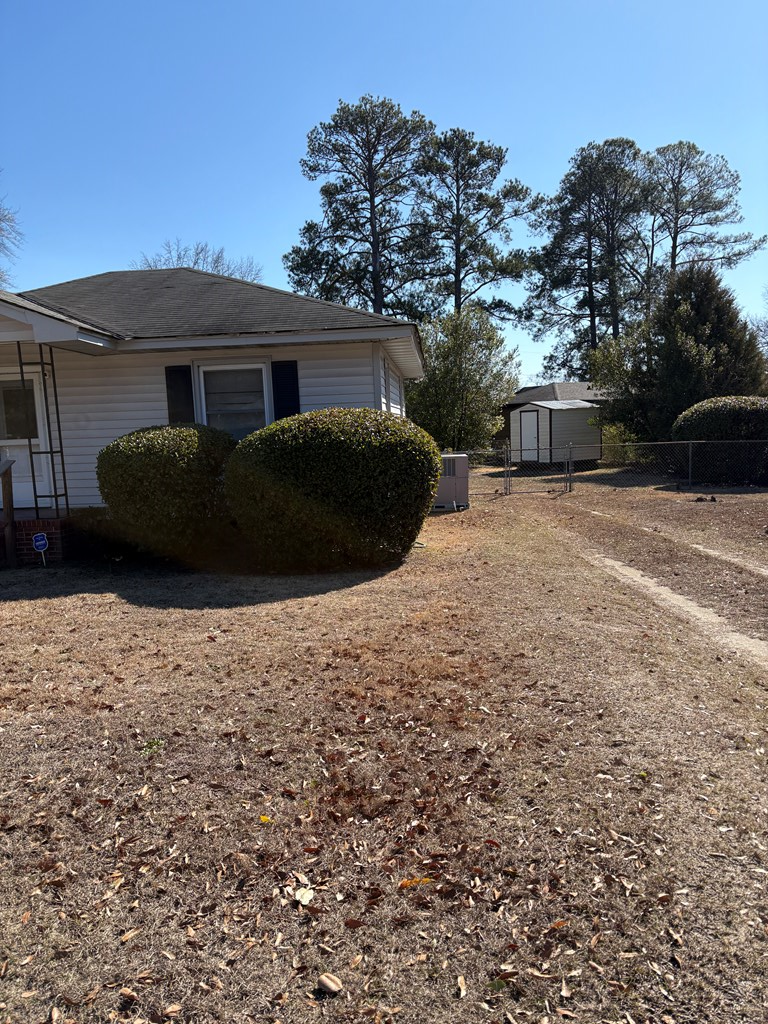 2534 Cole Drive Columbus, GA 31906 - Photo 4 of 18 a front view of a house with a yard and garage