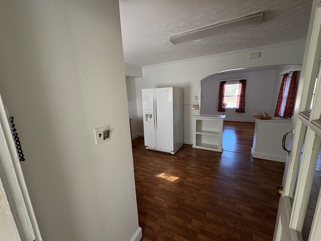 2534 Cole Drive Columbus, GA 31906 - Photo 10 of 18 a view of a livingroom with wooden floor and a kitchen space