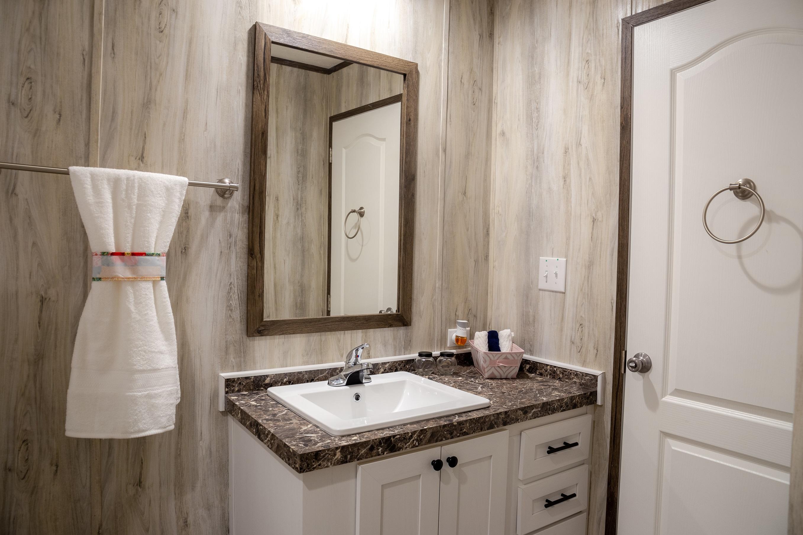 7400 Hardy Road Hardy, VA 24101 - Photo 2 of 57 a bathroom with a sink vanity granite and a mirror
