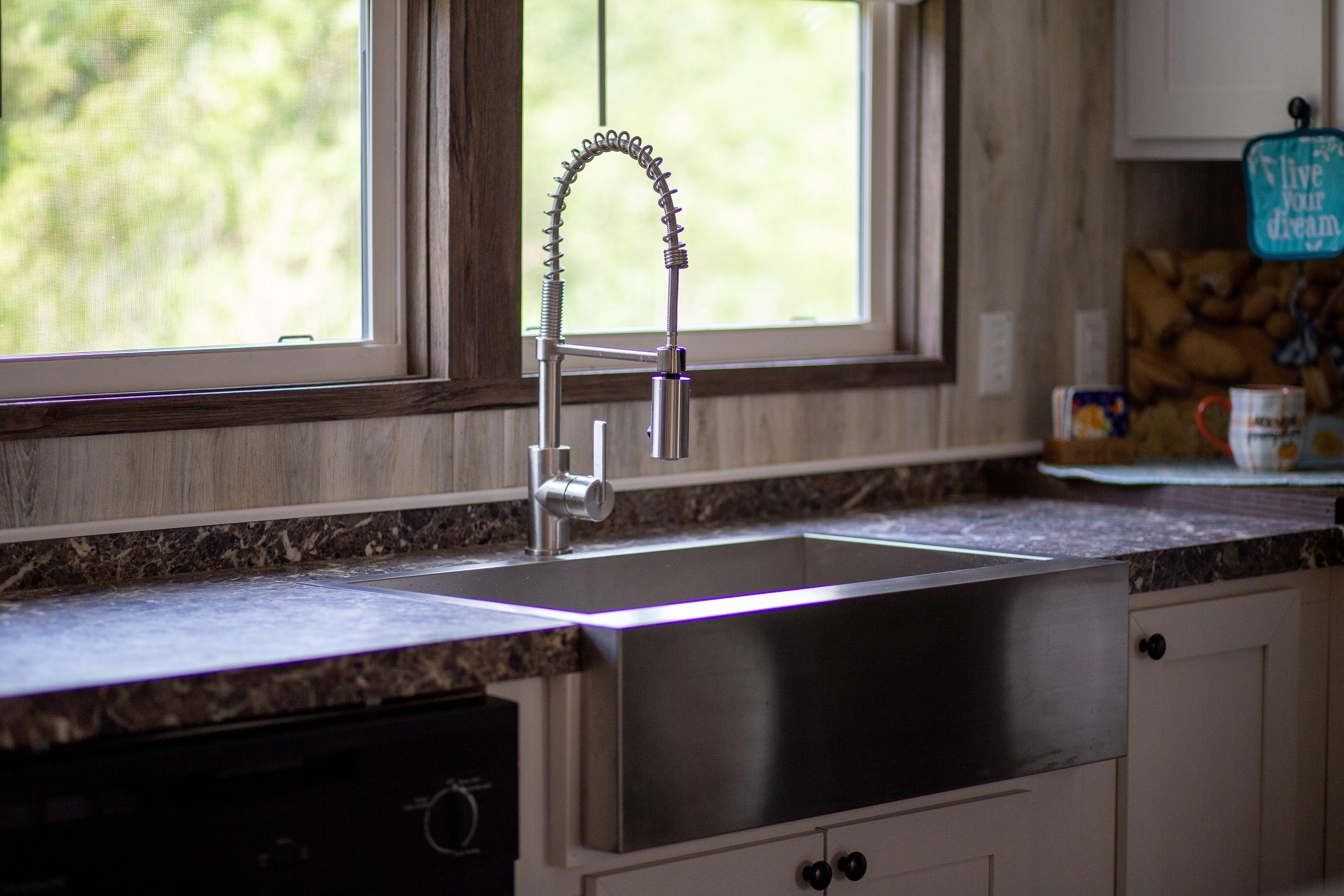 7400 Hardy Road Hardy, VA 24101 - Photo 16 of 57 a kitchen with a sink a stove and a window
