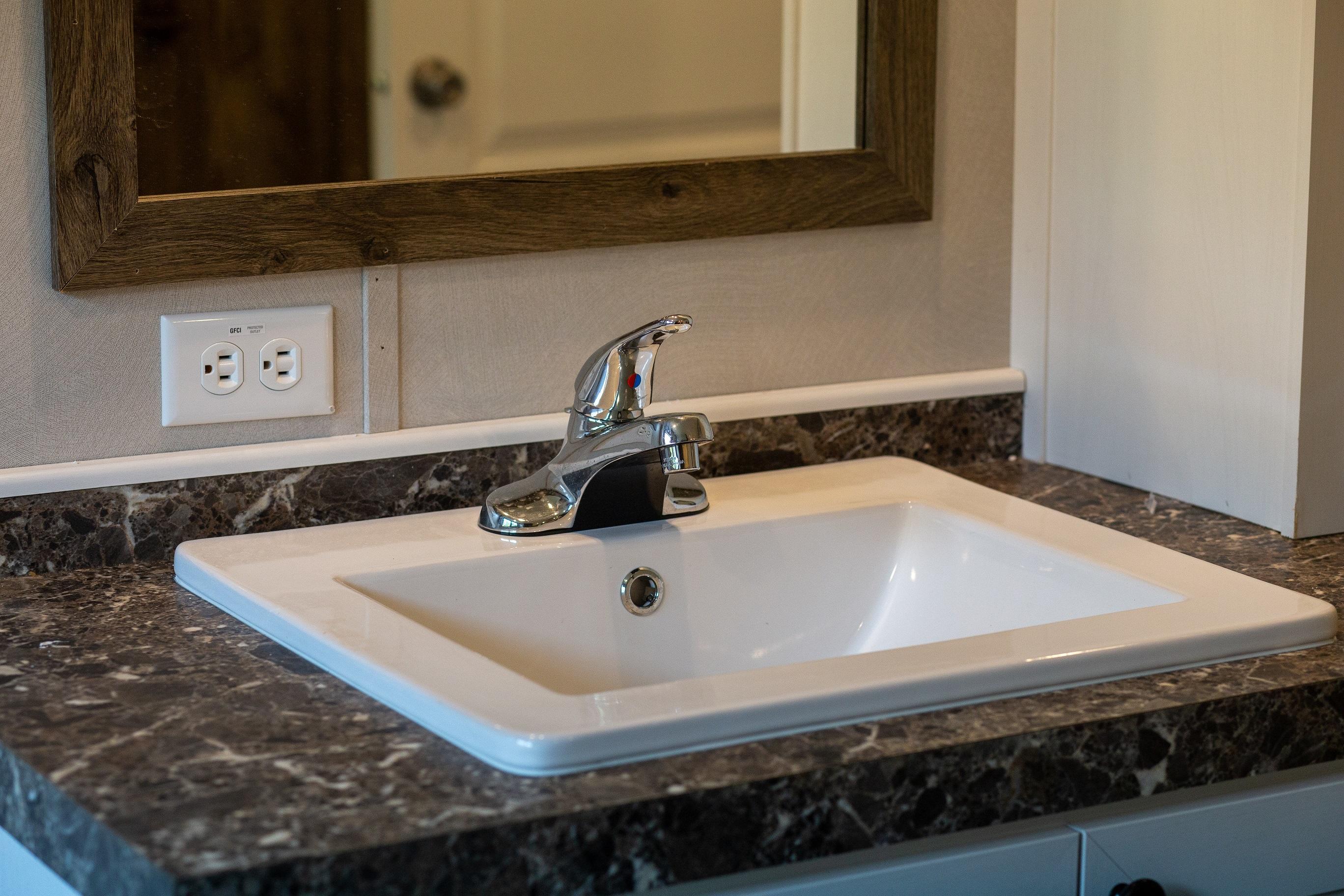 7400 Hardy Road Hardy, VA 24101 - Photo 17 of 57 a bathroom with a sink and a mirror