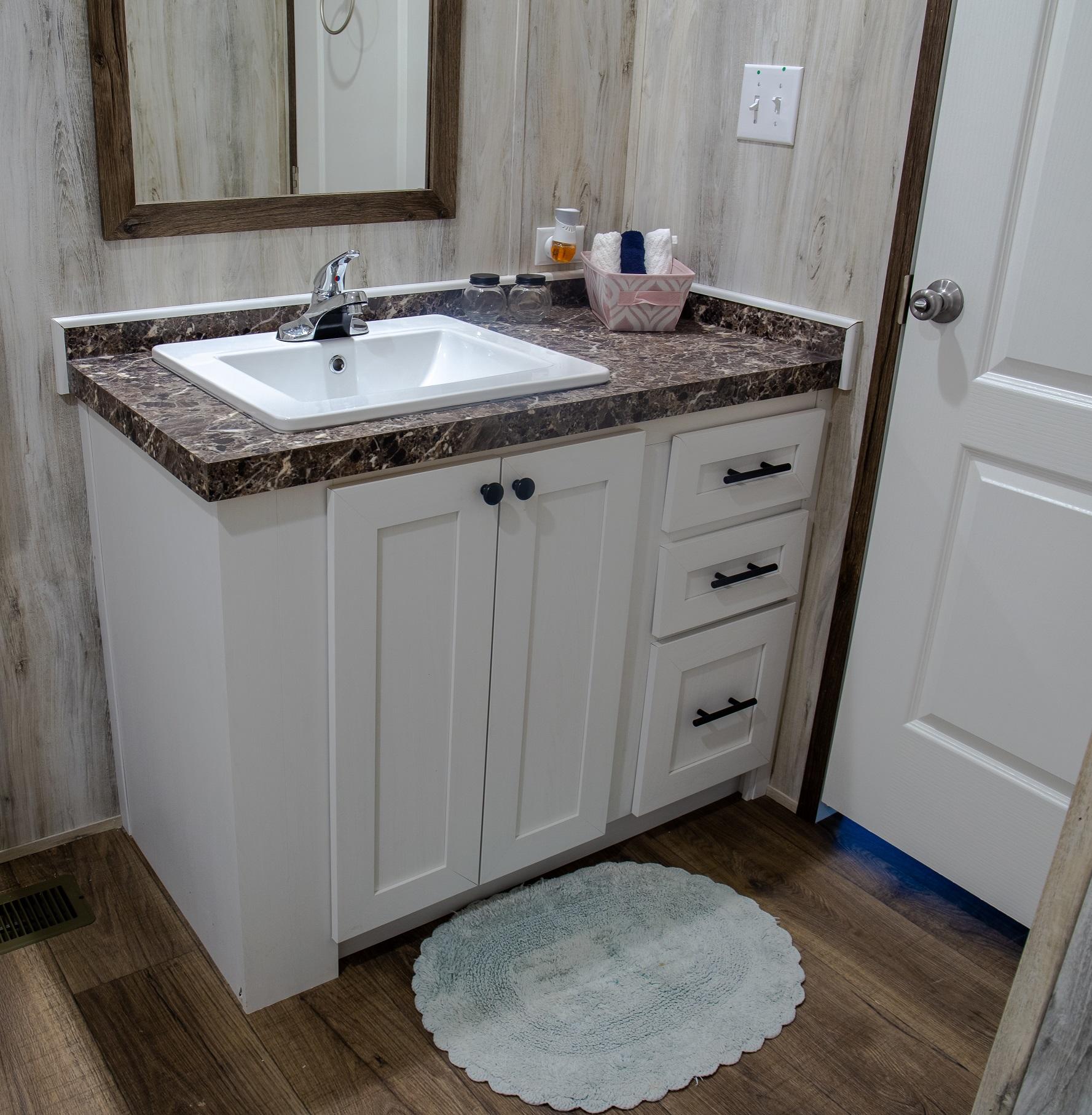 7400 Hardy Road Hardy, VA 24101 - Photo 3 of 57 a bathroom with a granite countertop sink and a mirror