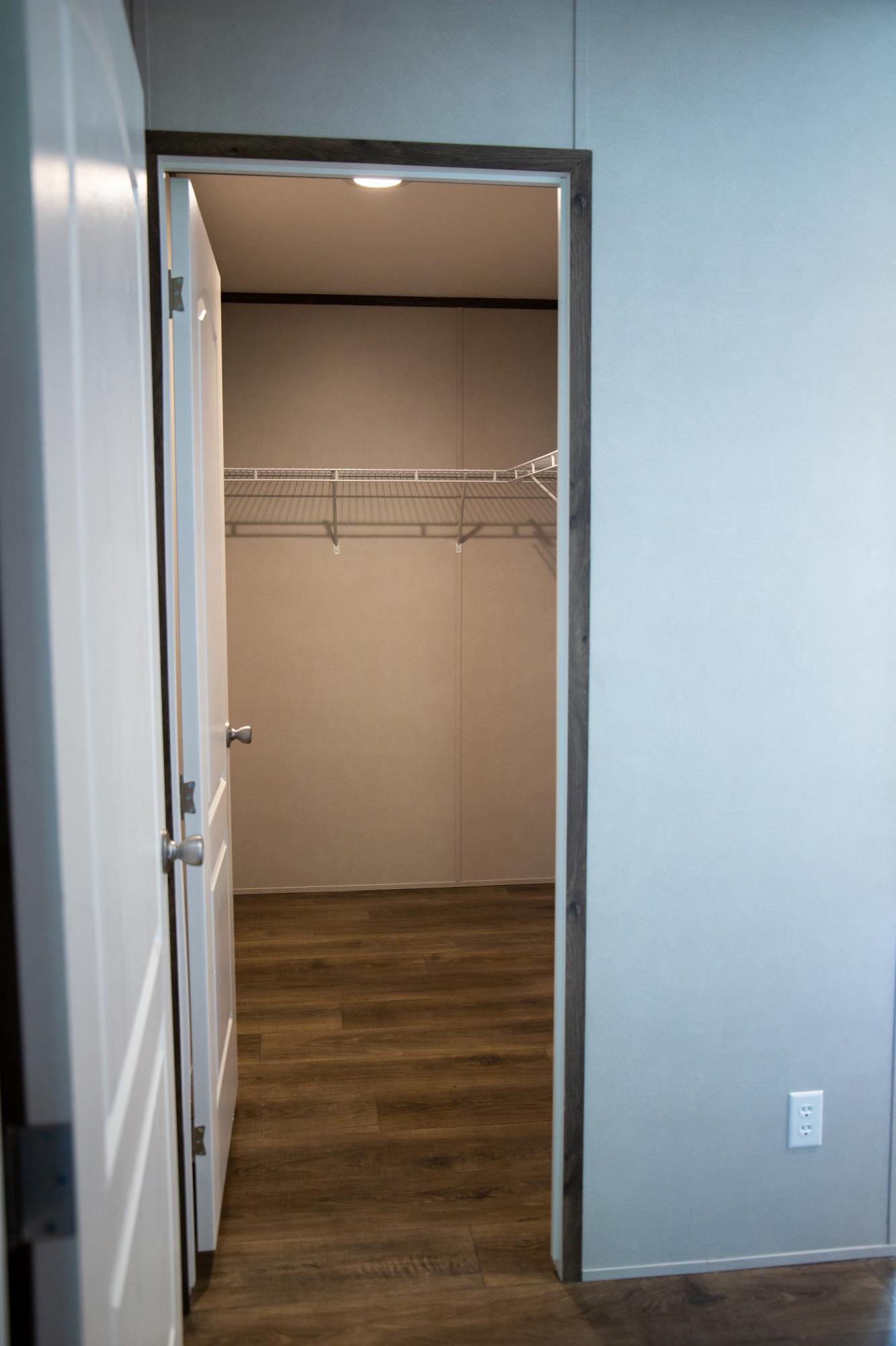 7400 Hardy Road Hardy, VA 24101 - Photo 27 of 57 a view of walk in closet with wooden floor