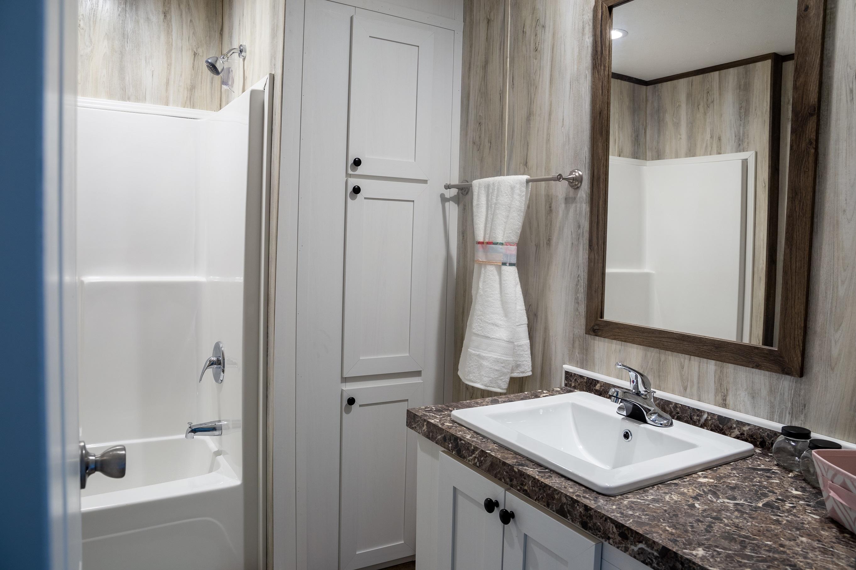 7400 Hardy Road Hardy, VA 24101 - Photo 4 of 57 a bathroom with a granite countertop sink and a mirror
