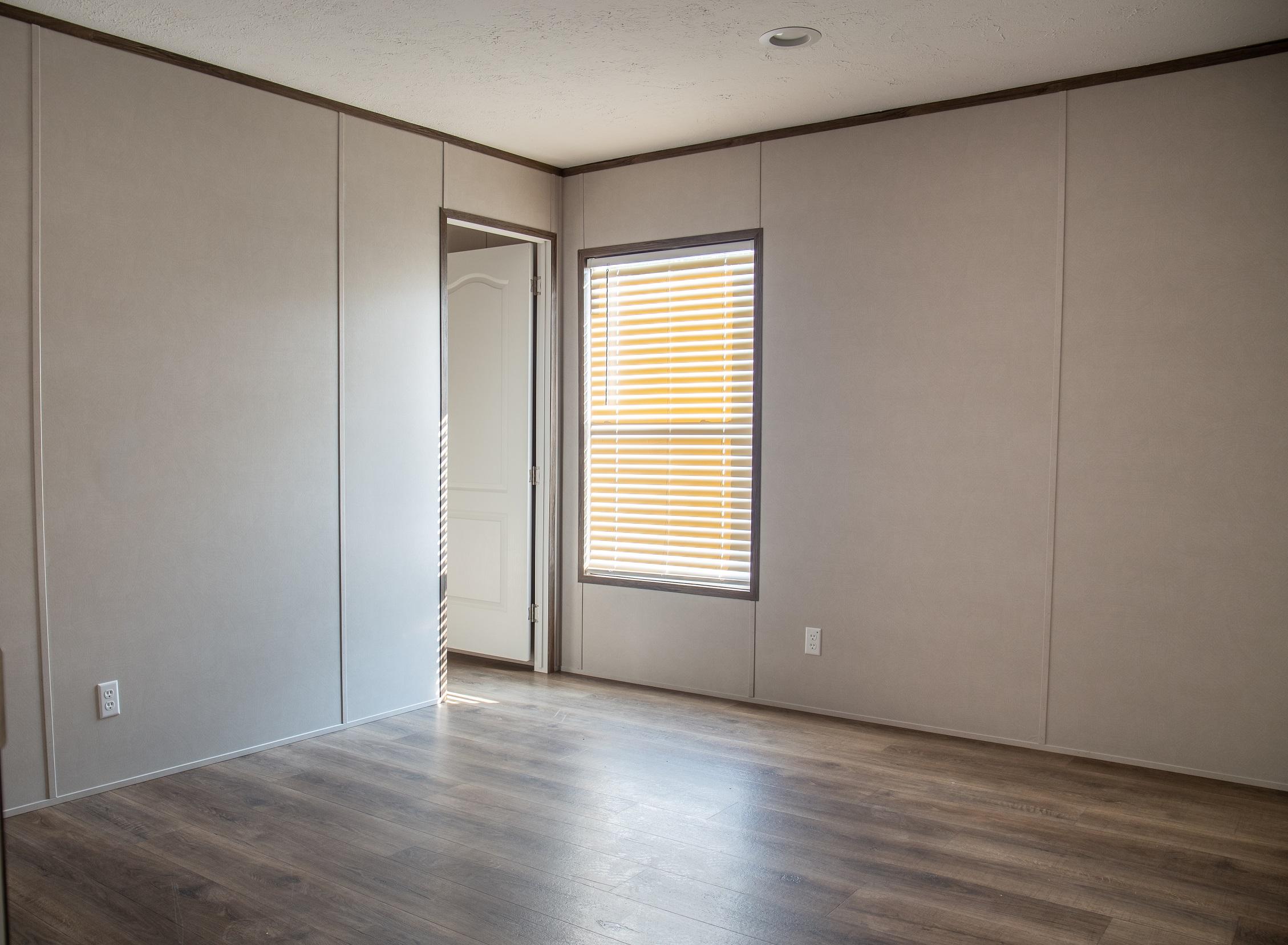 7400 Hardy Road Hardy, VA 24101 - Photo 34 of 57 a view of an empty room with wooden floor and a window