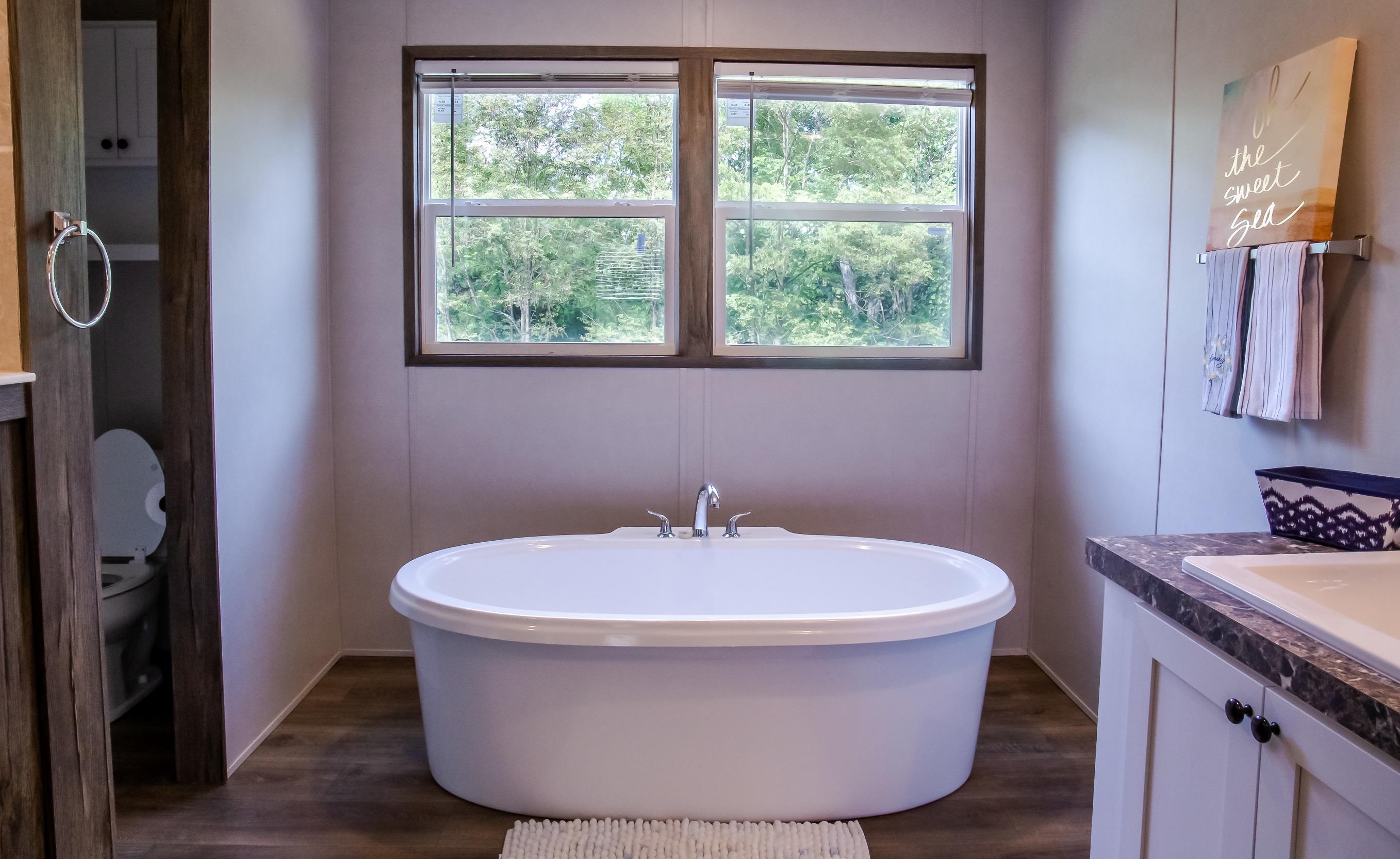 7400 Hardy Road Hardy, VA 24101 - Photo 8 of 57 a bathroom with a sink and a window