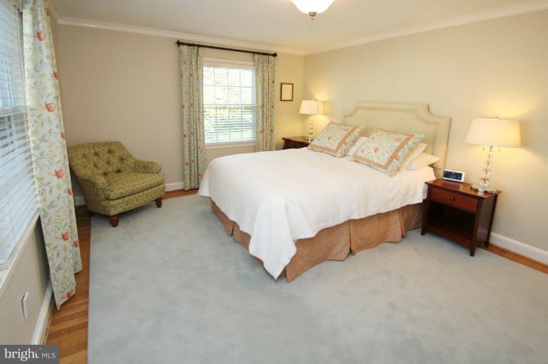 2 Lauer Terrace Silver Spring, MD 20901 - Photo 16 of 28 a spacious bedroom with a bed and a couch