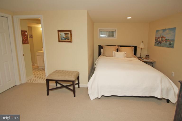 2 Lauer Terrace Silver Spring, MD 20901 - Photo 18 of 28 a bedroom with a bed and a chair