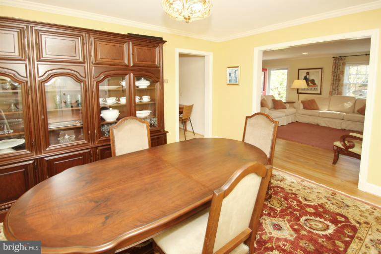 2 Lauer Terrace Silver Spring, MD 20901 - Photo 19 of 28 a dining room with wooden floor and large window