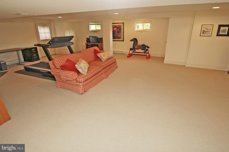 2 Lauer Terrace Silver Spring, MD 20901 - Photo 25 of 28 a living room with furniture and a flat screen tv